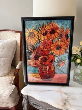 Framed reproduction of Vincent van Gogh's "Vase with Twelve Sunflowers”